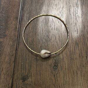 Elegant Gold Bangle with Shell Accent